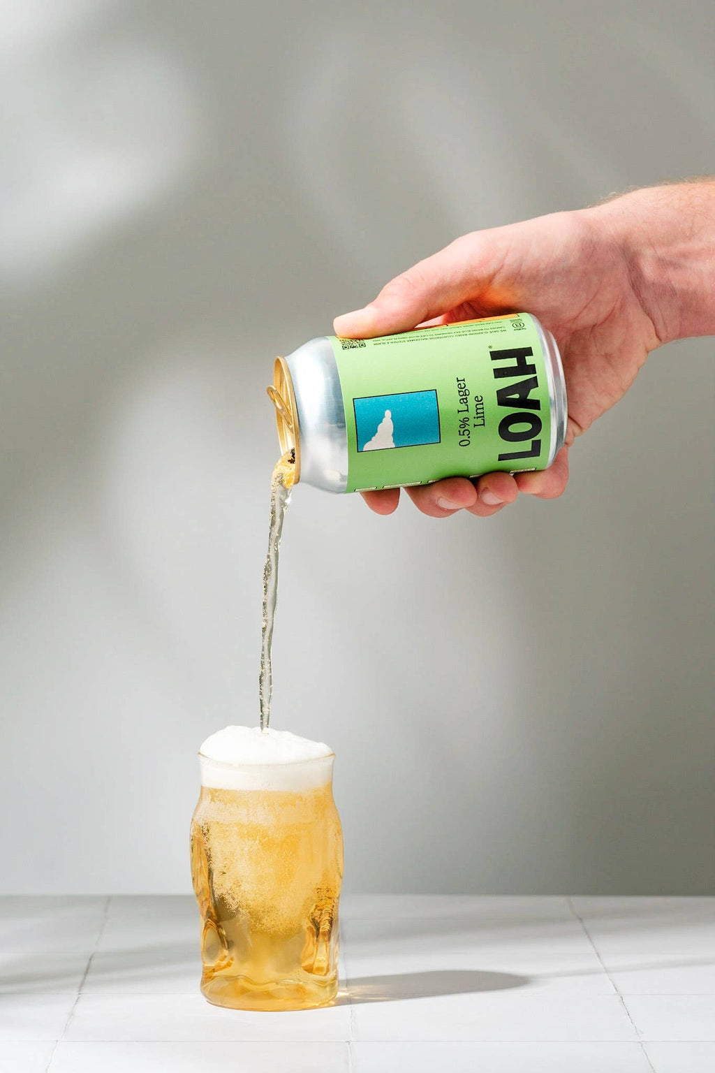 Loah 0.5% lager lime cans
